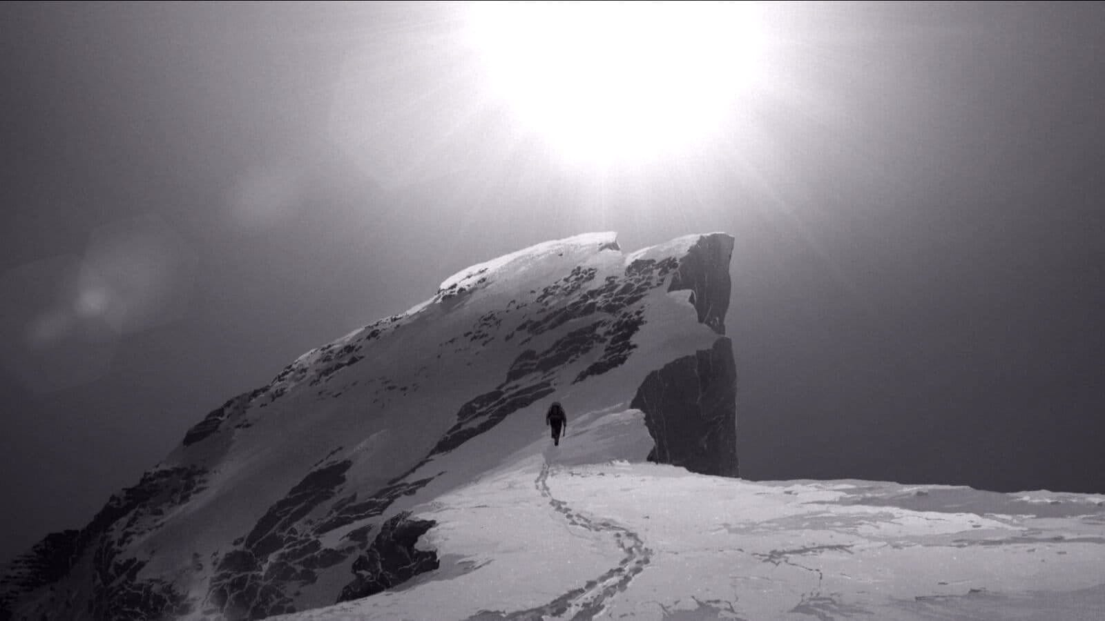 A scene from The Summit of the Gods showing a character heading towards a peak that he must climb alone to achieve accomplishment.